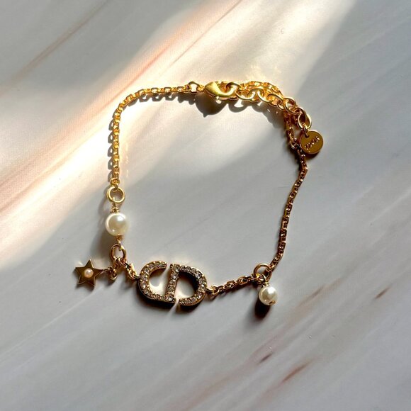 Dior Jewelry - Christian Dior Crystal & Resin Pearl Petit CD Charm Gold Bracelet